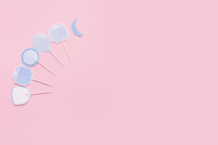 Stylish cupcake toppers on color backgroundの写真素材