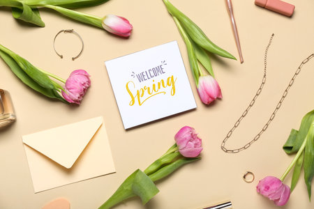 Composition with card, envelope, tulip flowers and accessories on color background. hello spring
