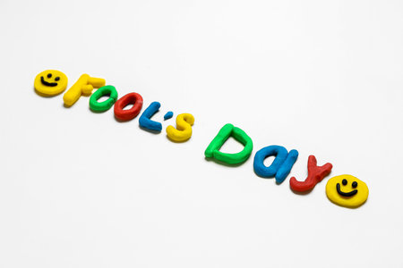 Text FOOL'S DAY made of plasticine on light backgroundの写真素材