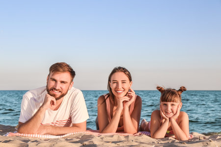 happy family on sea beachの写真素材