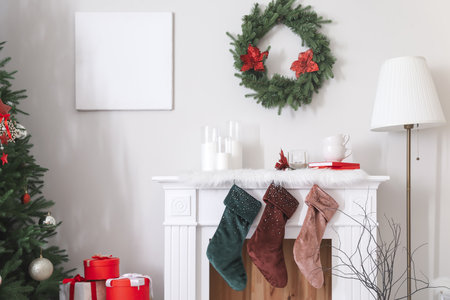 Interior of living room with fireplace decorated for Christmasの写真素材