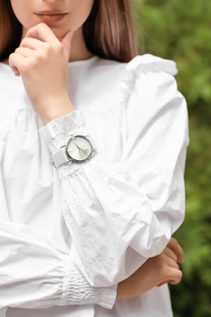 Woman with stylish wrist watch, closeupの写真素材