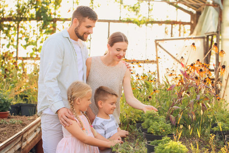 Young family working in the garden