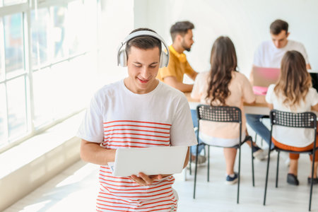 Students with modern devices studying online indoors