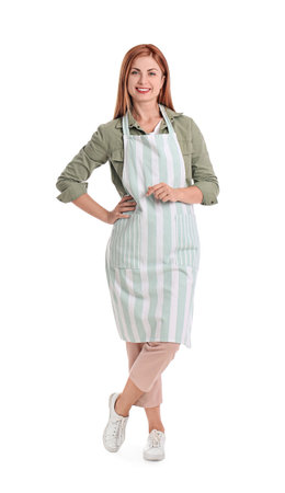 Beautiful young woman wearing apron on white backgroundの写真素材