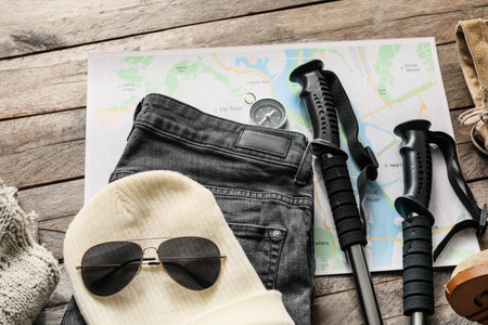 Equipment for hiking on wooden table