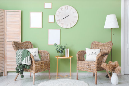 Interior of modern room with wicker chairsの写真素材