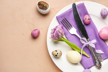 Table serving with Easter eggs and tulip flower on brown grunge background