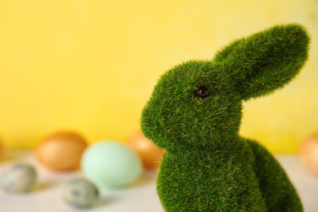 easter bunny on yellow background, closeupの写真素材