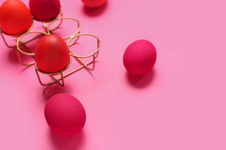 Dyed Easter eggs on pink backgroundの写真素材