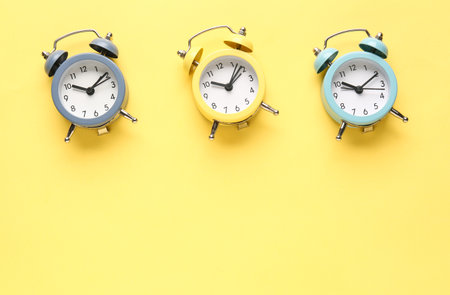 Alarms on yellow background