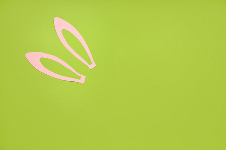 paper bunny ears on green backgroundの写真素材