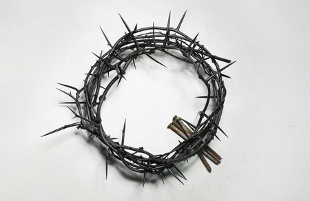 Crown of thorns and nails on light backgroundの写真素材