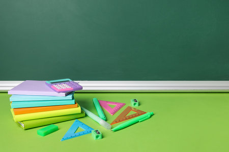 Stationery on color table in classroom. Pi Day celebrationの写真素材