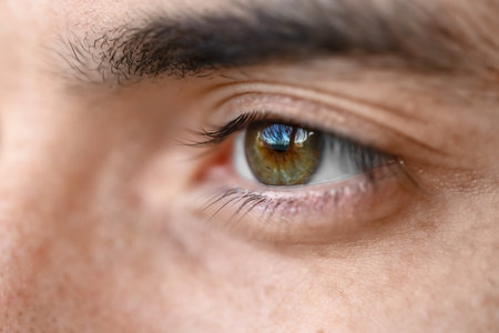 Young man with brown eyesの写真素材