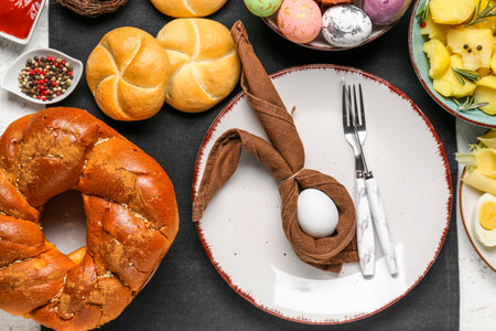 Easter table setting with tasty dishes, closeup