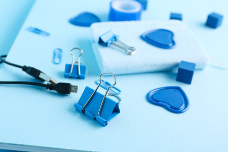 Set of stationery and USB cable on color background, closeupの写真素材