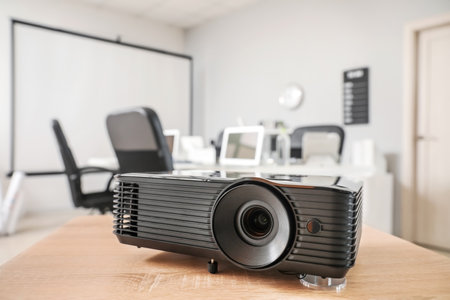 Video projector on table in conference hall, closeupの写真素材