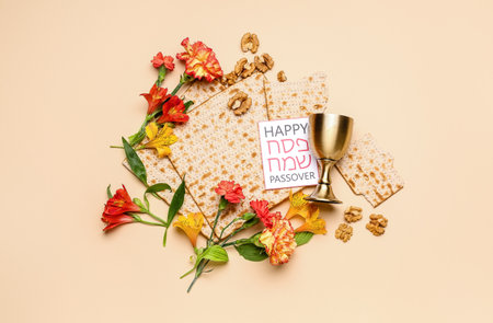 Composition with flatbread matza, greeting card, cup, walnuts and flowers on color background