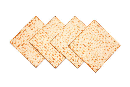 Jewish flatbread matza for Passover isolated on white backgroundの写真素材