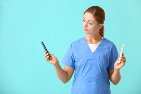 Doctor with lancet pens on color background. Diabetes conceptの写真素材