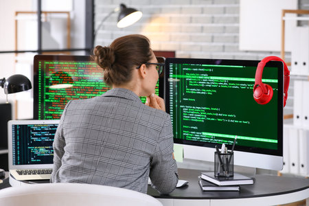 Female programmer working in officeの写真素材