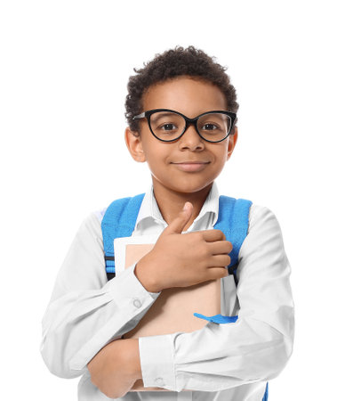 Little African-American schoolboy on white backgroundの写真素材