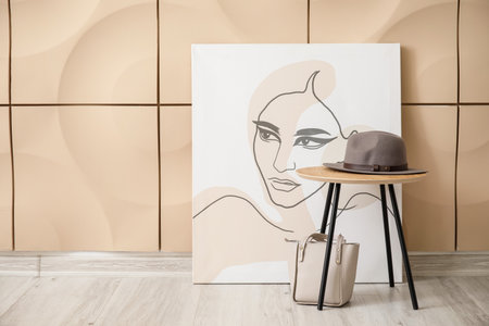 Stylish table with color wall in roomの写真素材