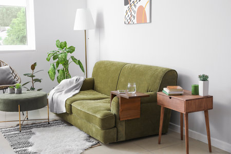 Armrest table on sofa in interior of roomの写真素材