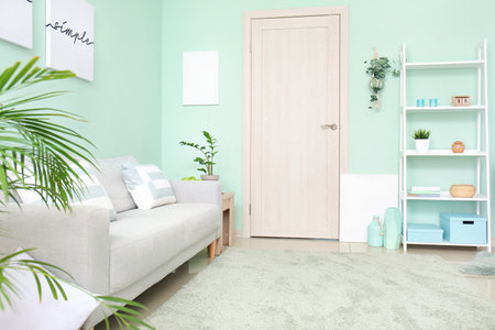 Interior of room with stylish mint wallの写真素材