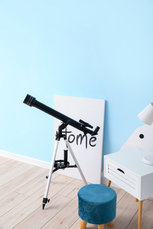 Interior of modern room with telescopeの写真素材