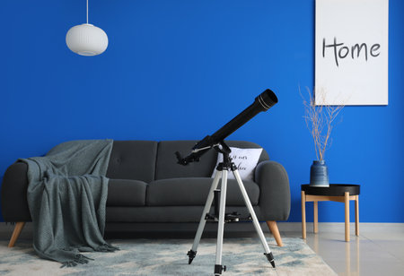 Interior of modern room with telescopeの写真素材