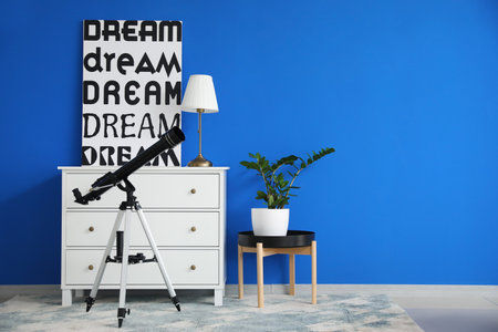 Interior of modern room with telescopeの写真素材