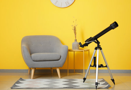 Interior of modern room with telescopeの写真素材