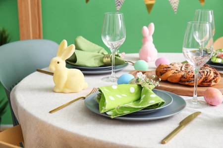 Beautiful table setting for Easter celebration in dining room