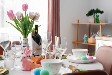 Beautiful table serving for Easter celebration in dining roomの写真素材