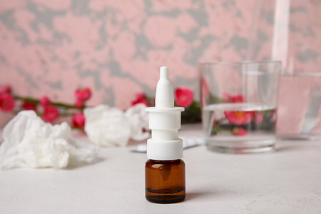 Nasal drops on white table. Seasonal allergy conceptの写真素材