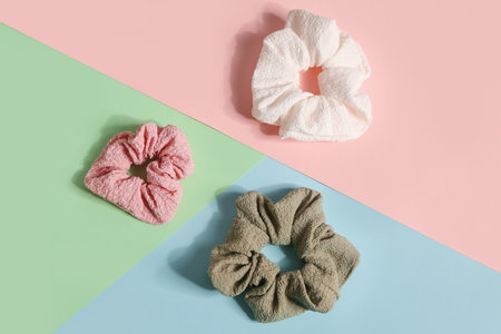 Set of scrunchies on color backgroundの写真素材