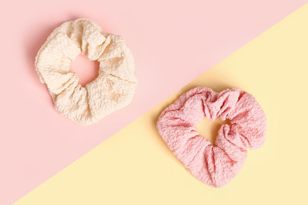 Stylish scrunchies on color backgroundの写真素材