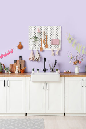 Interior of modern kitchen decorated for Easter celebrationの写真素材