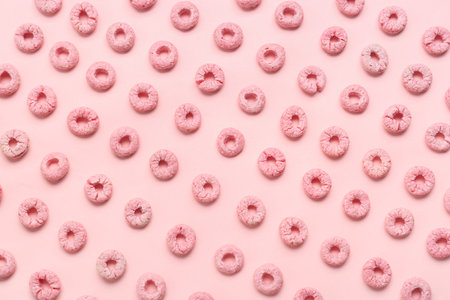 Many cereal rings on pink backgroundの写真素材