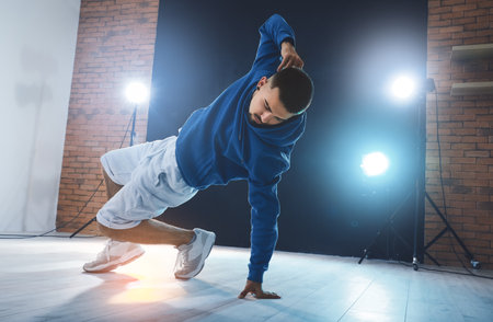 Male hip hop dancer in studioの写真素材