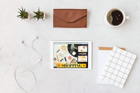 Composition with tablet computer on light background. online shopping conceptの写真素材