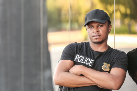 African-American police officer in the streetの写真素材