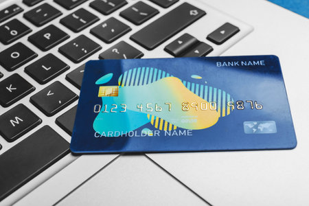 Credit card on laptop, closeupの写真素材