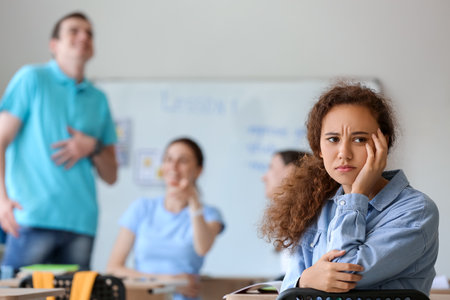 People bullying African-American woman at the university. stop racismの写真素材