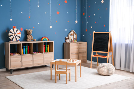Interior of modern playroom in kindergartenの写真素材