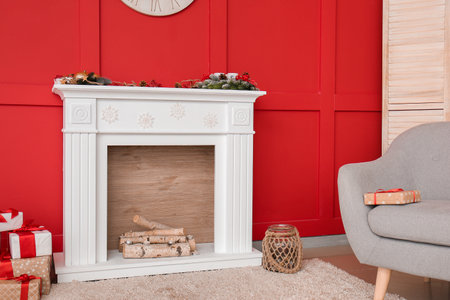 Interior of modern room with fireplace on Christmas eveの写真素材