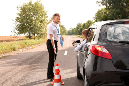 Instructor conducting driver license testの写真素材