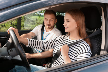 Instructor conducting driver license testの写真素材